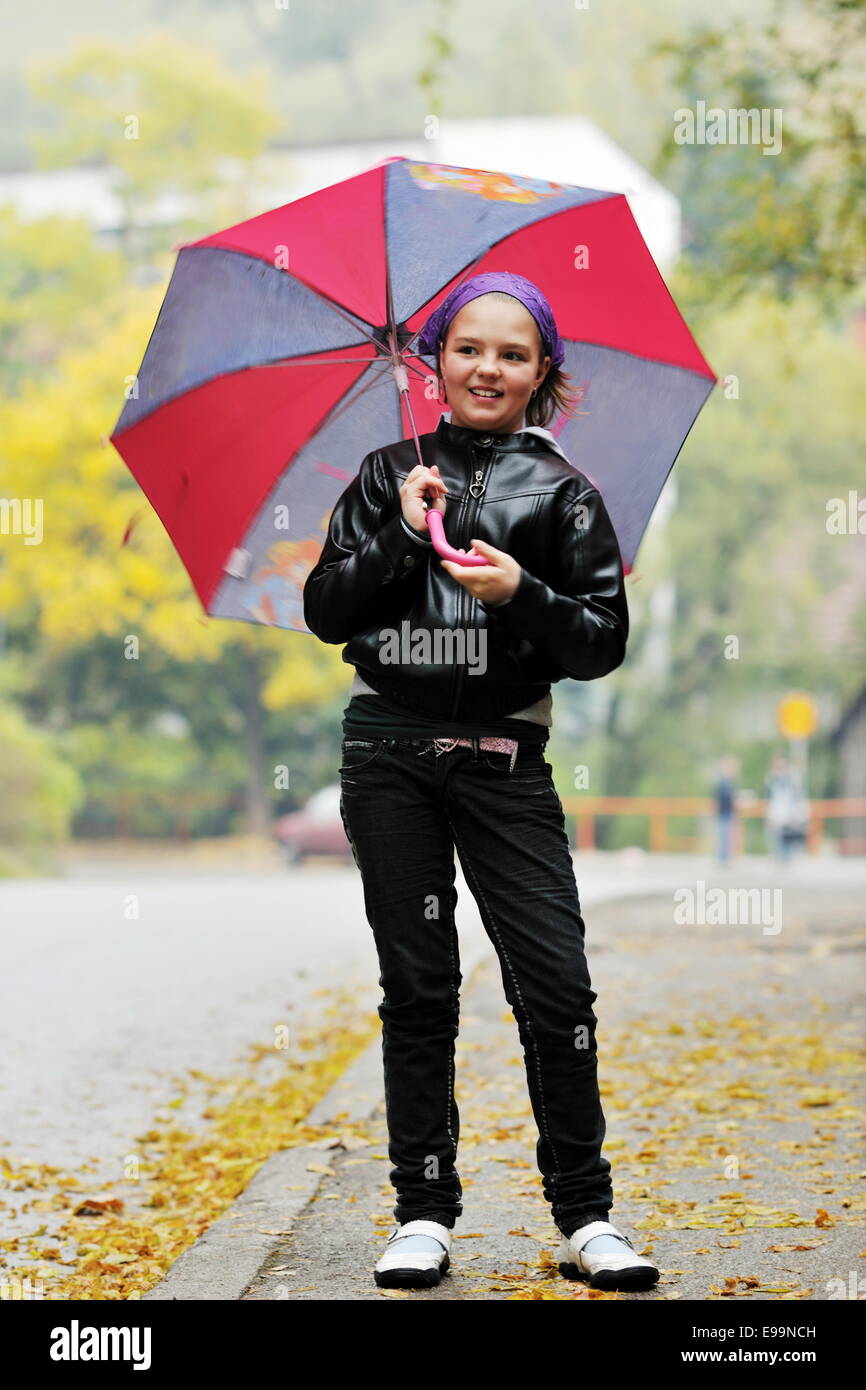 happy girl with umbrella Stock Photo - Alamy