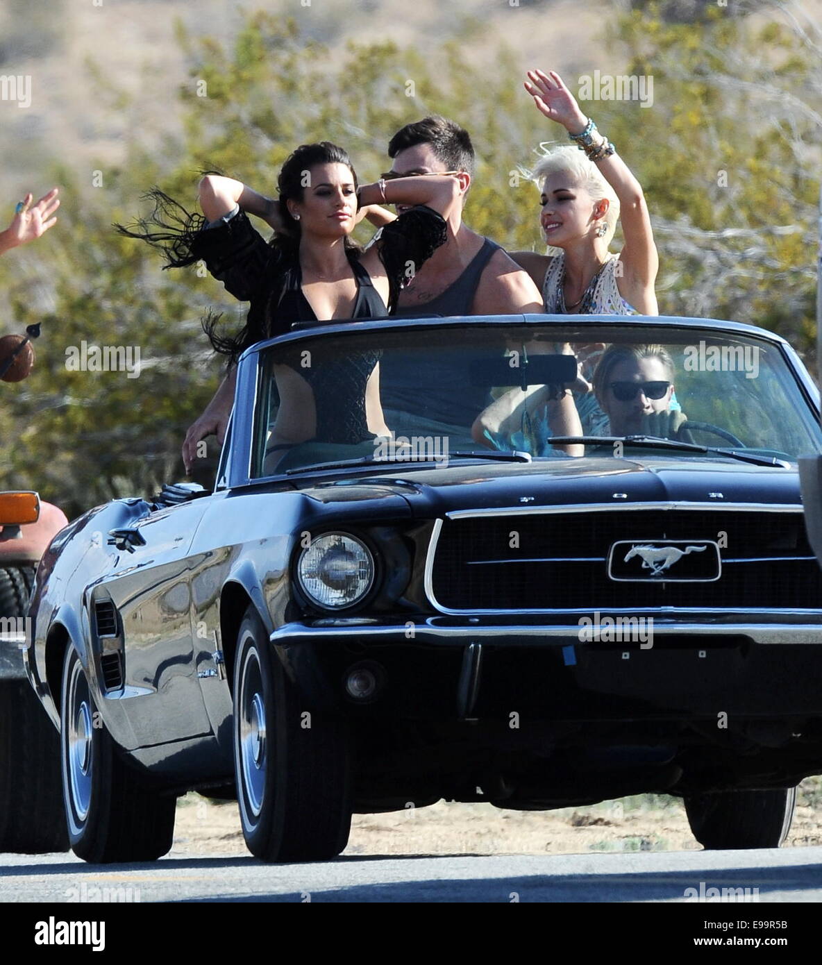Glee star Lea Michele sports a black one-piece bikini for her new music  video "On My Way", filming in Palmdale, California. The actress can be seen  sitting on top of a black