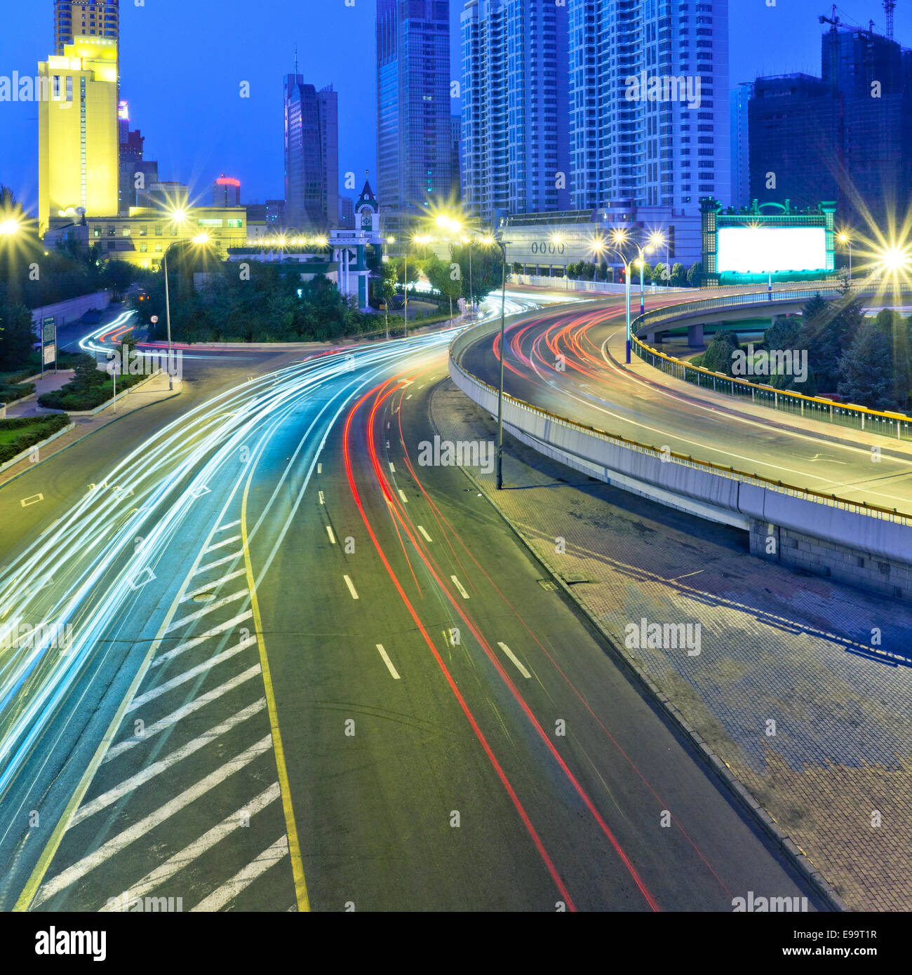 Traffic through downtown  the lujiazui financial centre in shanghai china. Stock Photo