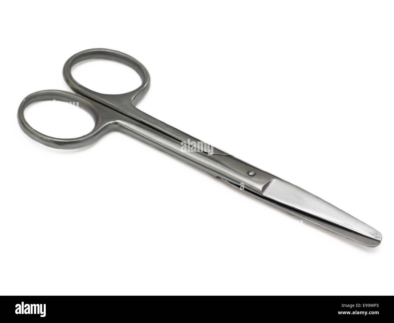 Metal medical shears on a white background Stock Photo - Alamy