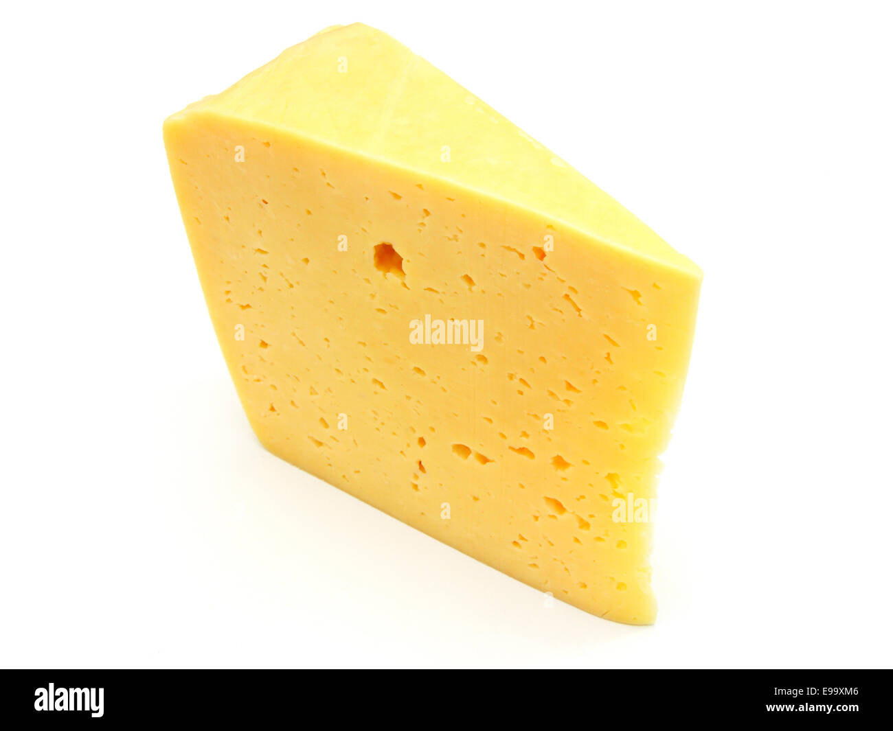 A piece of Swiss cheese Stock Photo Alamy