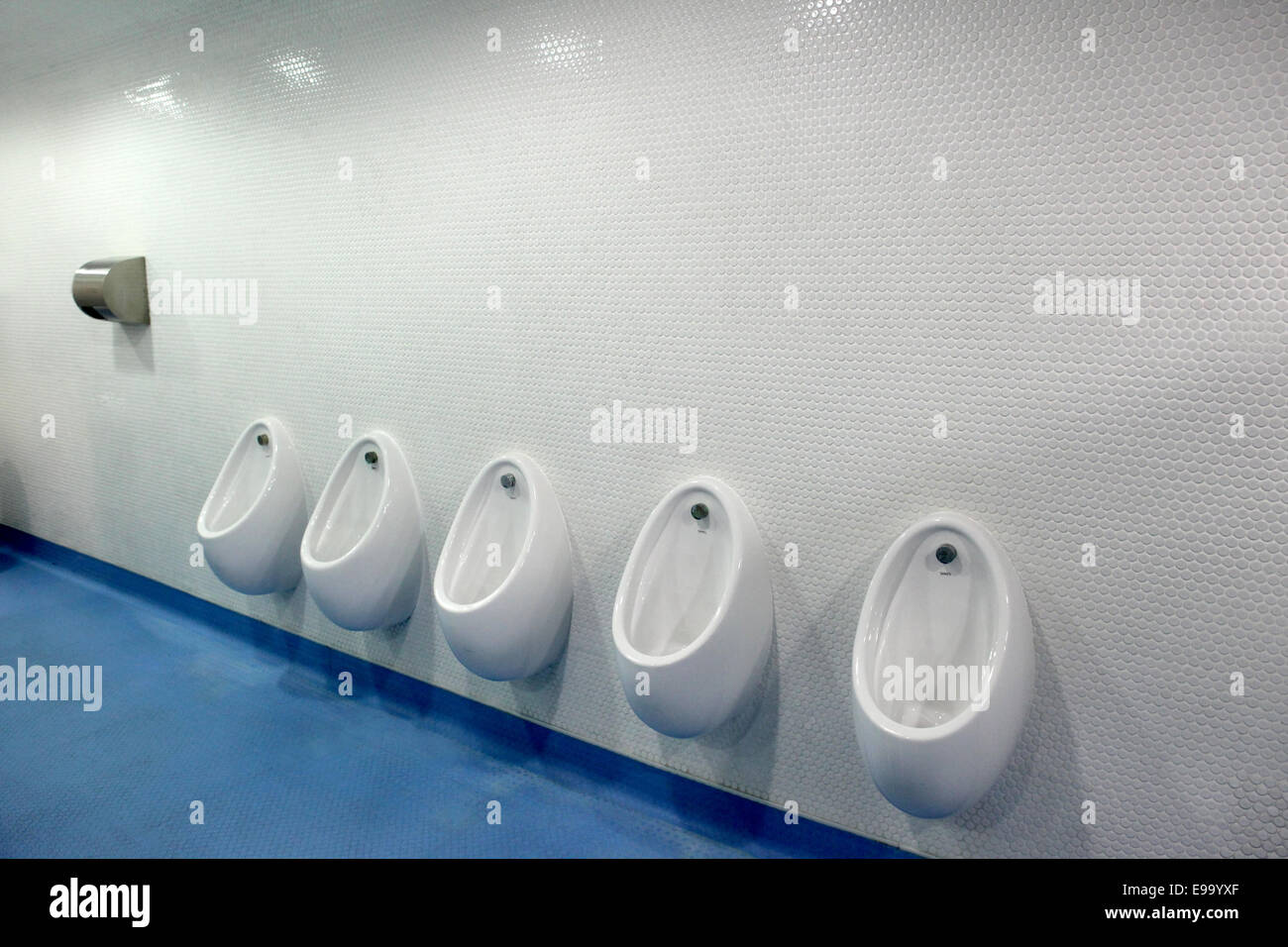 Line of five white urinals in public toilet Stock Photo Alamy