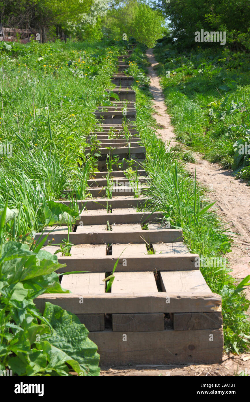 The wooden ladder is located a hill slope Stock Photo Alamy