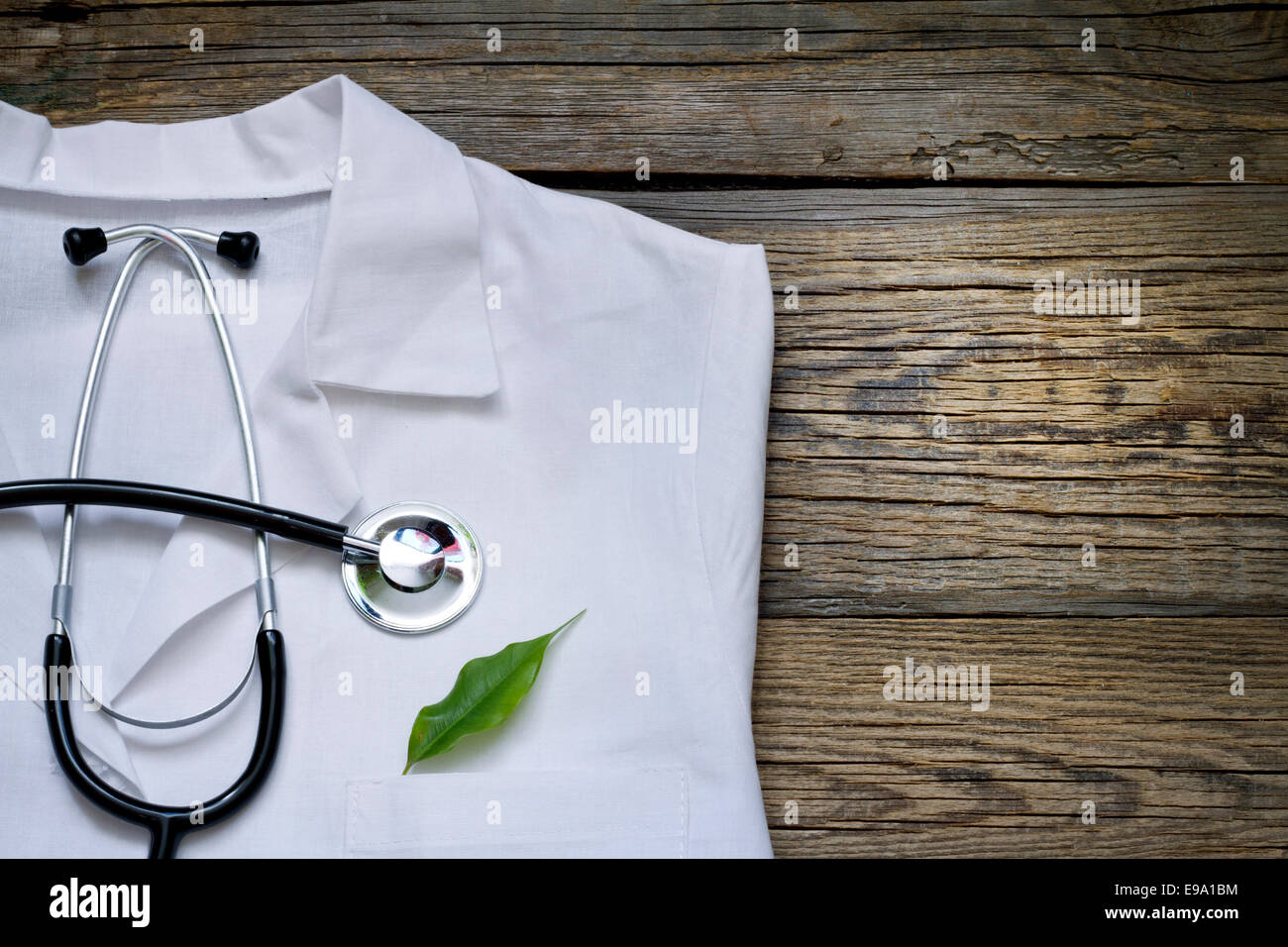 Alternative medicine stethoscope and green symbol background concept Stock Photo
