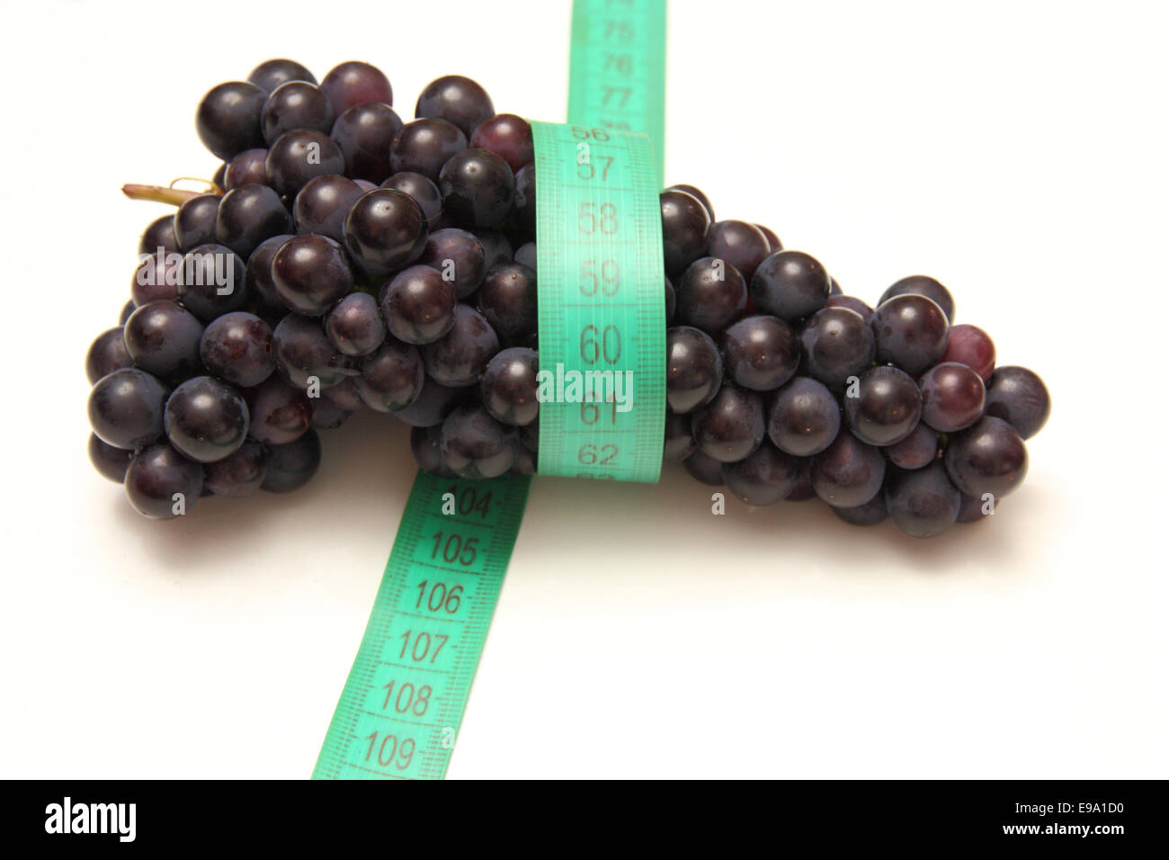 measuring tape around grapes Stock Photo - Alamy