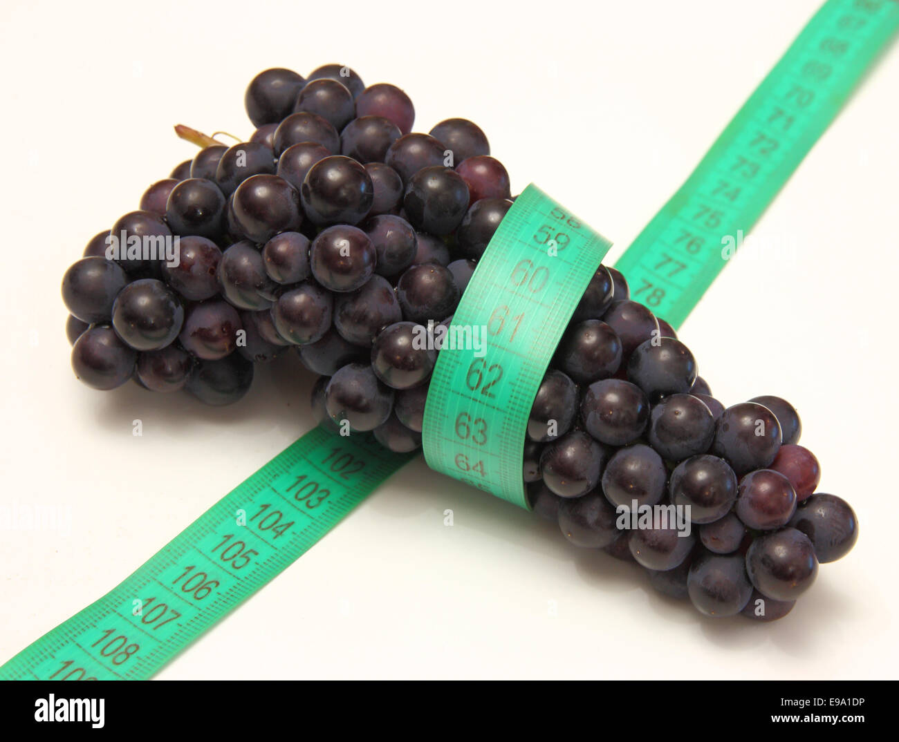 measuring tape around grapes Stock Photo - Alamy