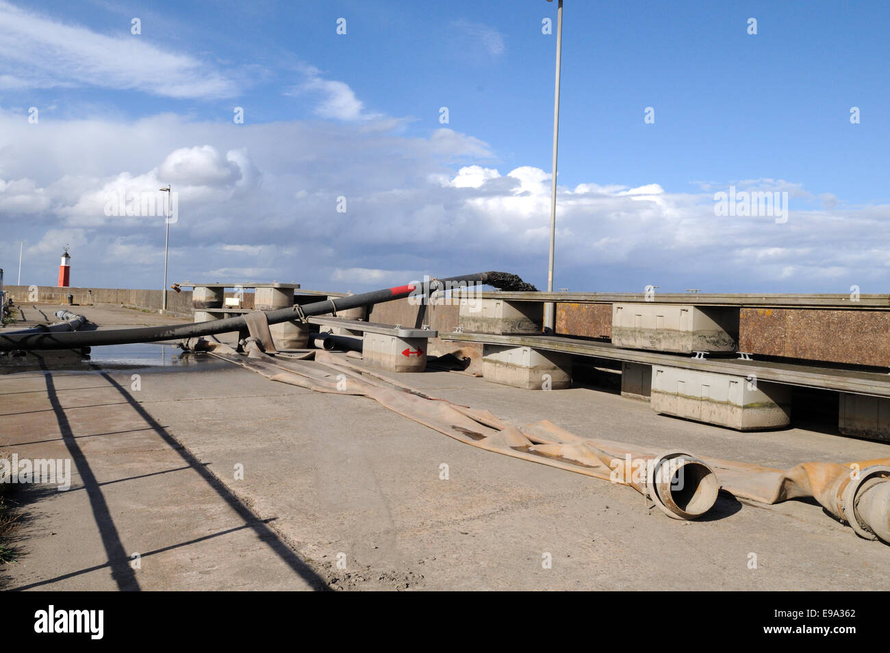 Silt being pumped out of Watchet harbour Somerset England UK GB Stock Photo