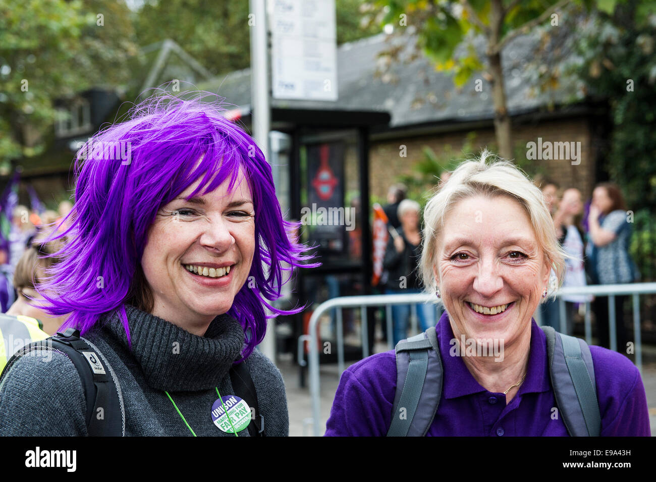 A TUC national demonstration in Central London. Two colourful members of  UNISON enjoying the march. Stock Photo