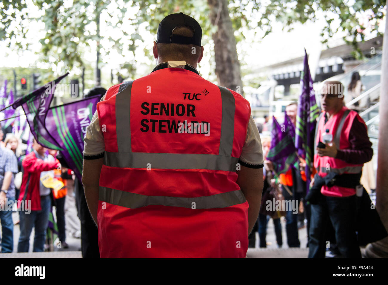 A TUC national demonstration in Central London.  A senior steward prepares for the start of the march. Stock Photo