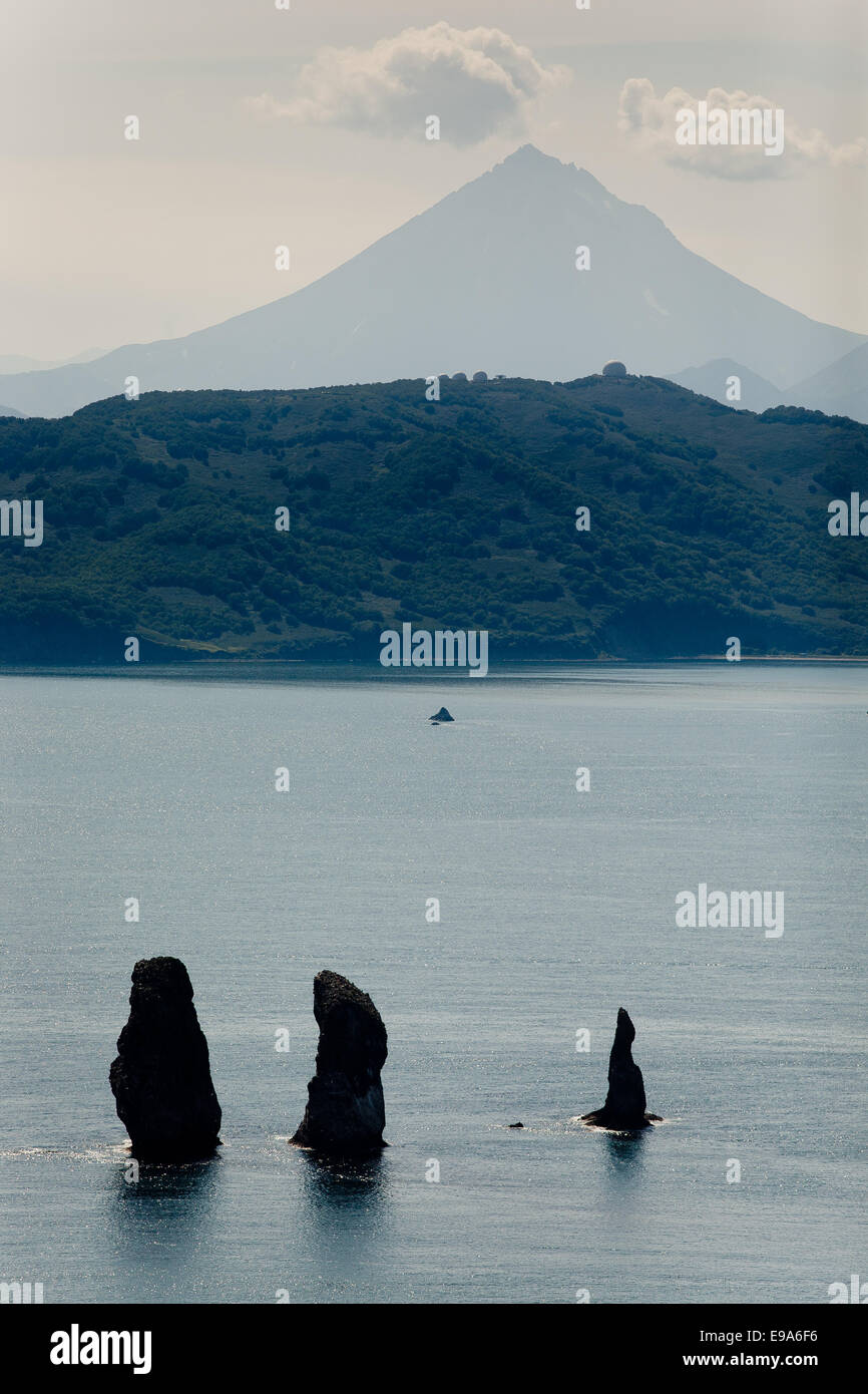 Three Brothers Rocks and volcano Stock Photo - Alamy