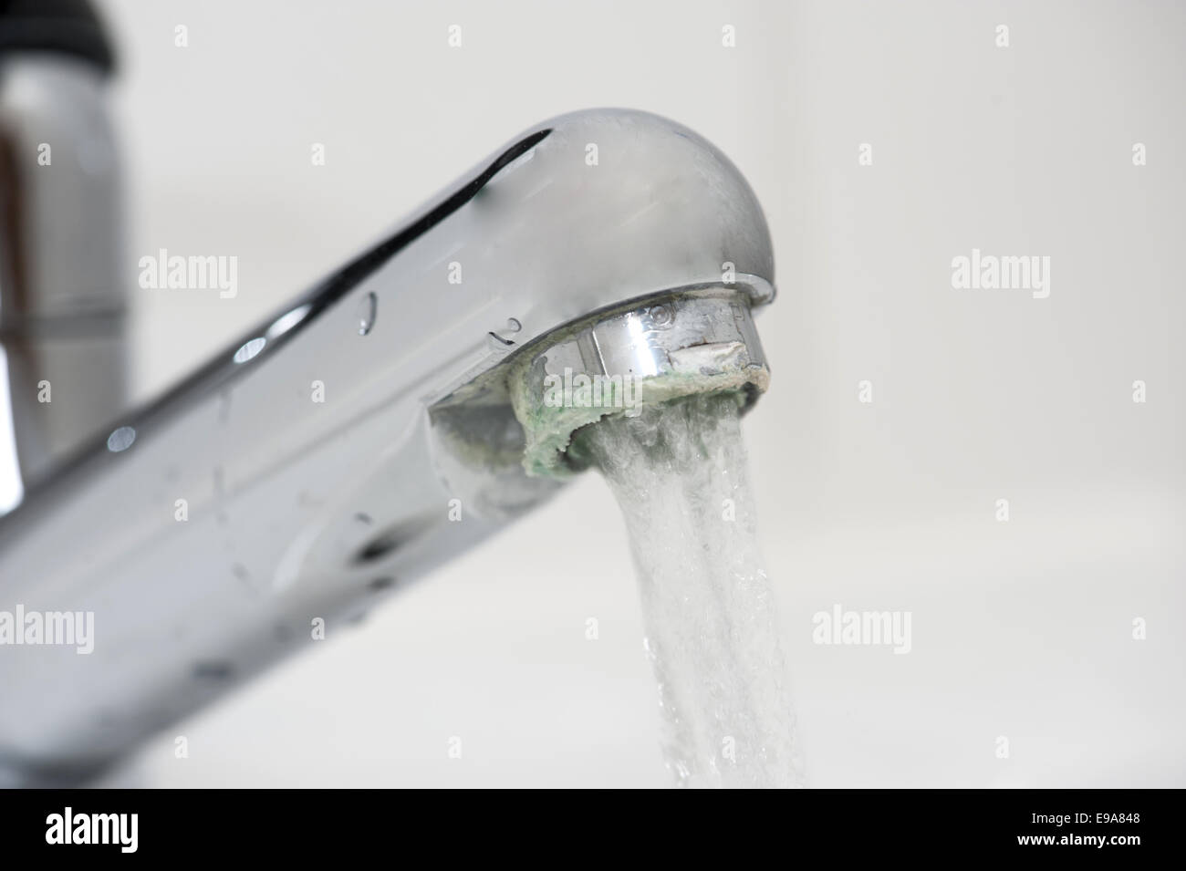 Calcium deposits on faucet Stock Photo Alamy