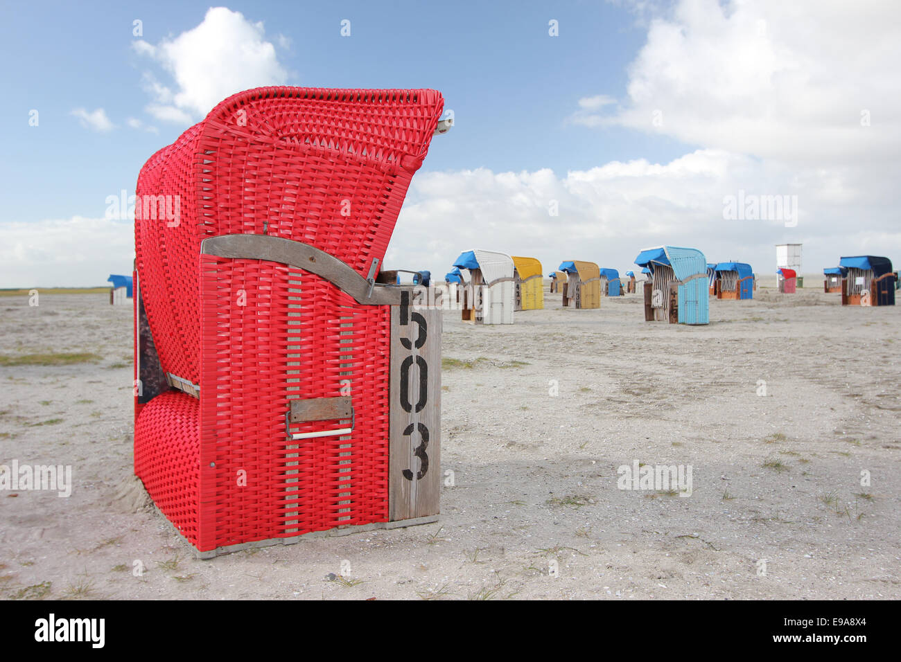 Red beach chair on the North Sea, Germany Stock Photo