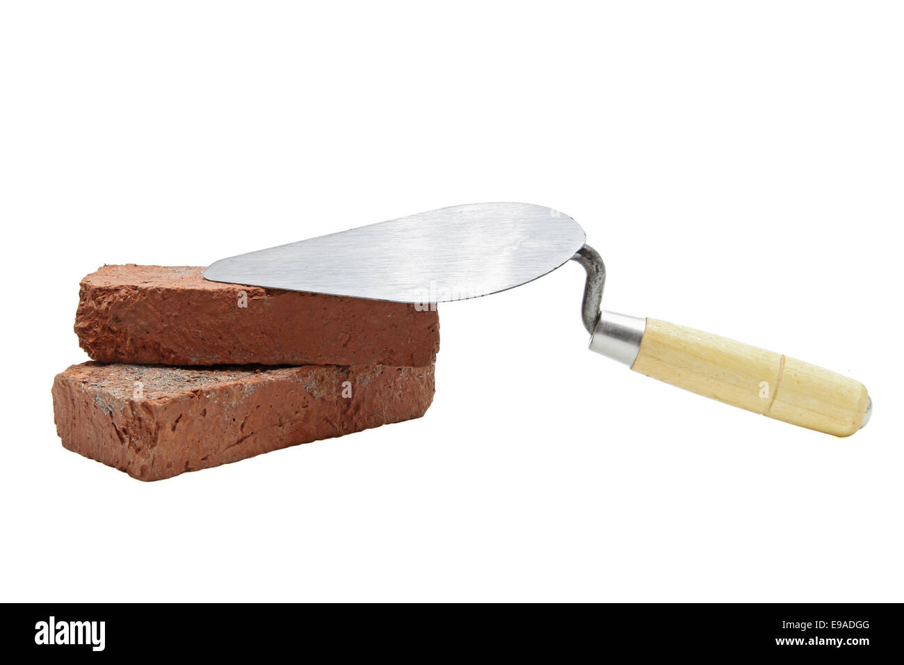 construction lute trowel with red brick Stock Photo Alamy