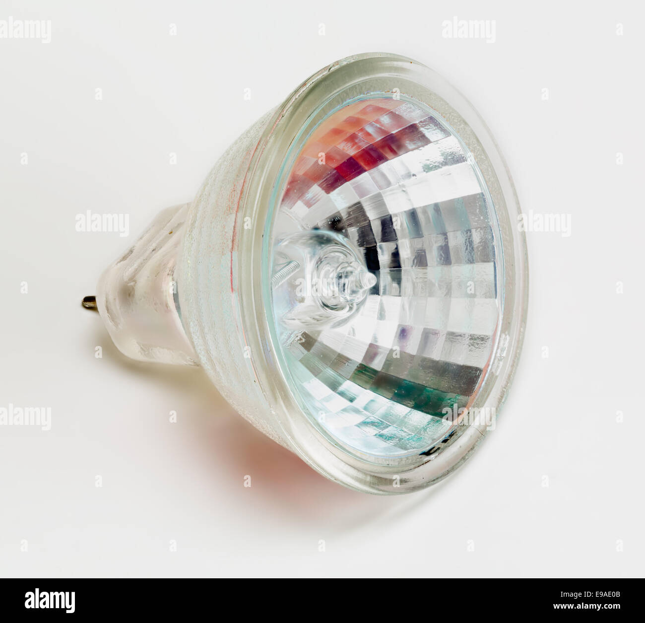 Halogen light bulb lit from side isolated Stock Photo