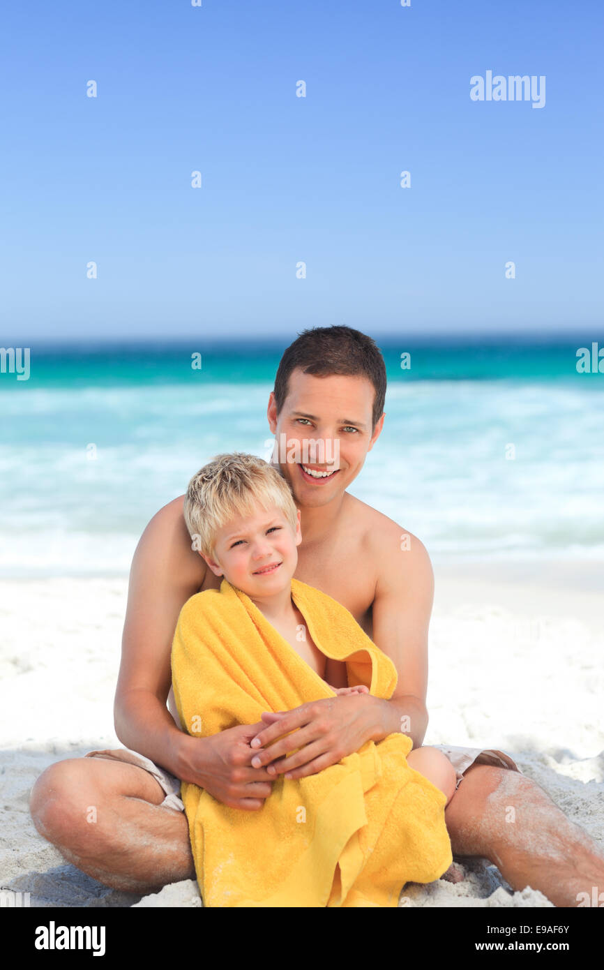 Father with his son in his towel Stock Photo Alamy