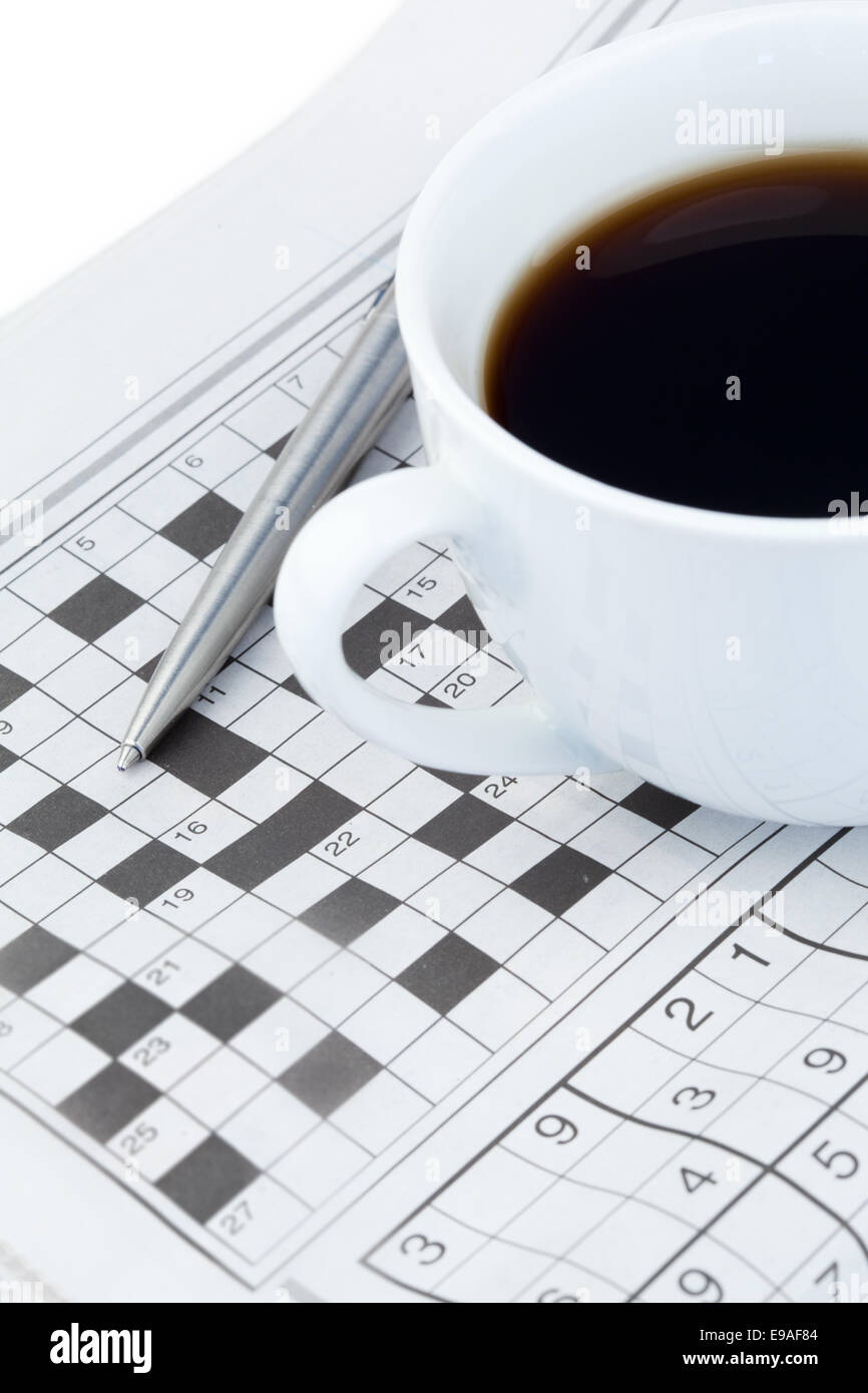 Newspapers and crossword puzzle Stock Photo - Alamy
