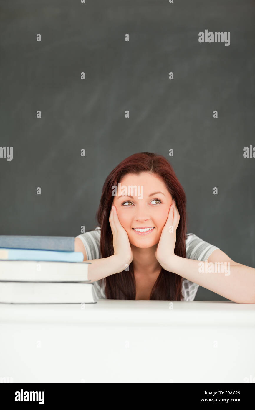 Portrait of a young student with books Stock Photo - Alamy