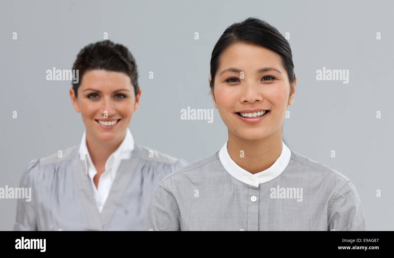 Happy Business co-workers standing in a line Stock Photo - Alamy
