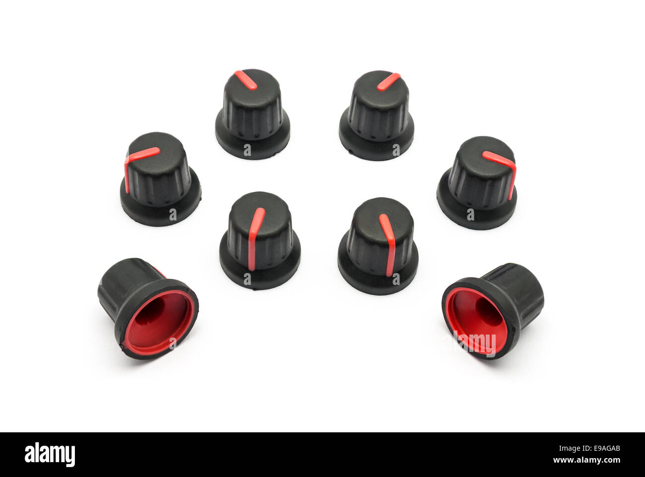 Pile of Red Knobs for Variable Resistor. Stock Photo