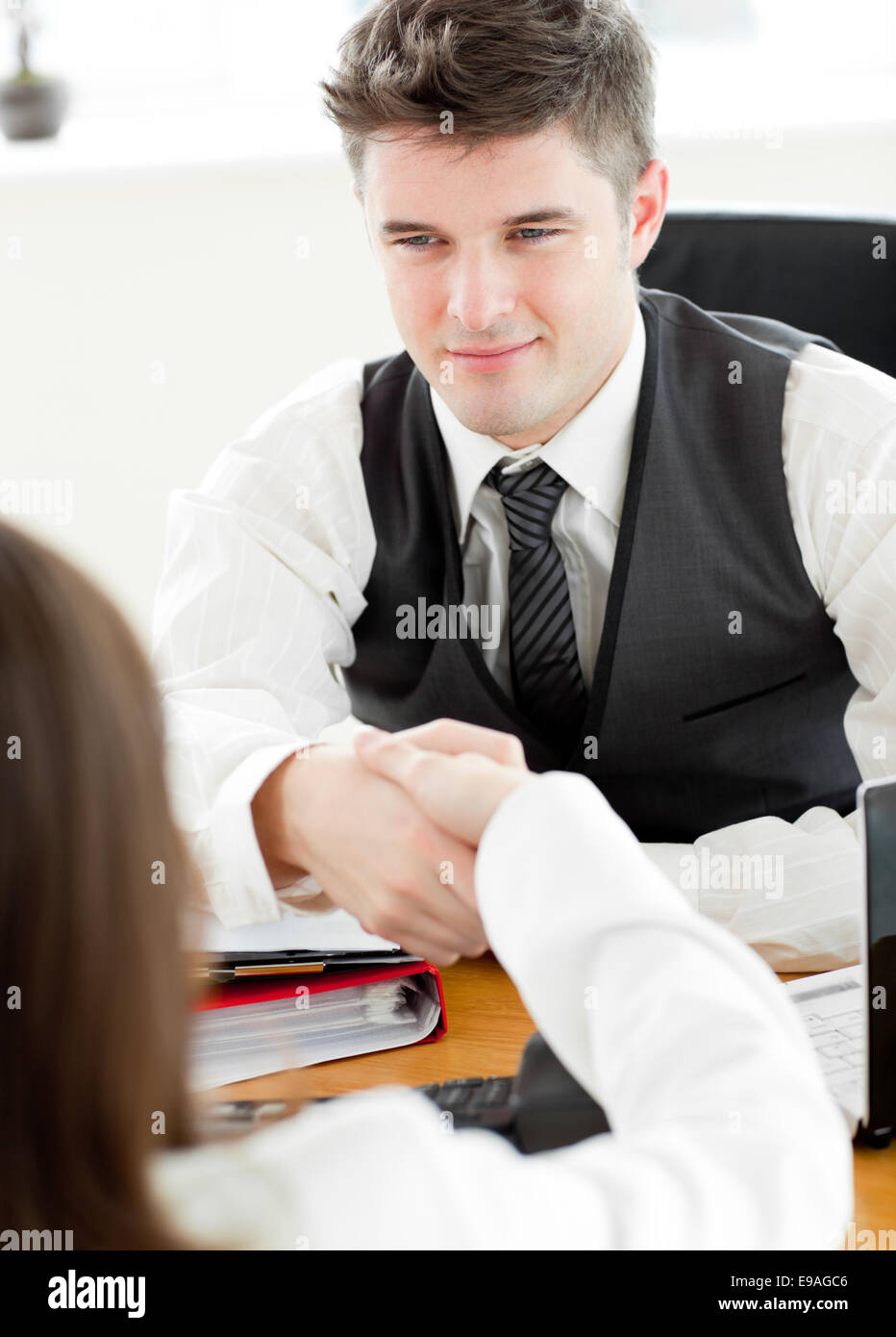 Boy man shaking hands hires stock photography and images Alamy