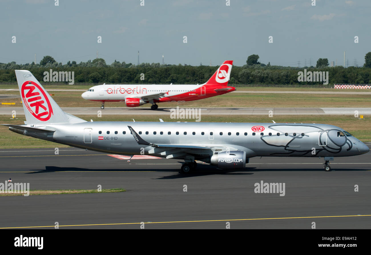 Niki Airways Embraer 190 commercial jet airliner taxiing to the runway at  Dusseldorf International airport Germany Stock Photo - Alamy