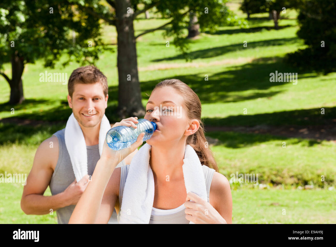 Sporty couple in the park Stock Photo - Alamy