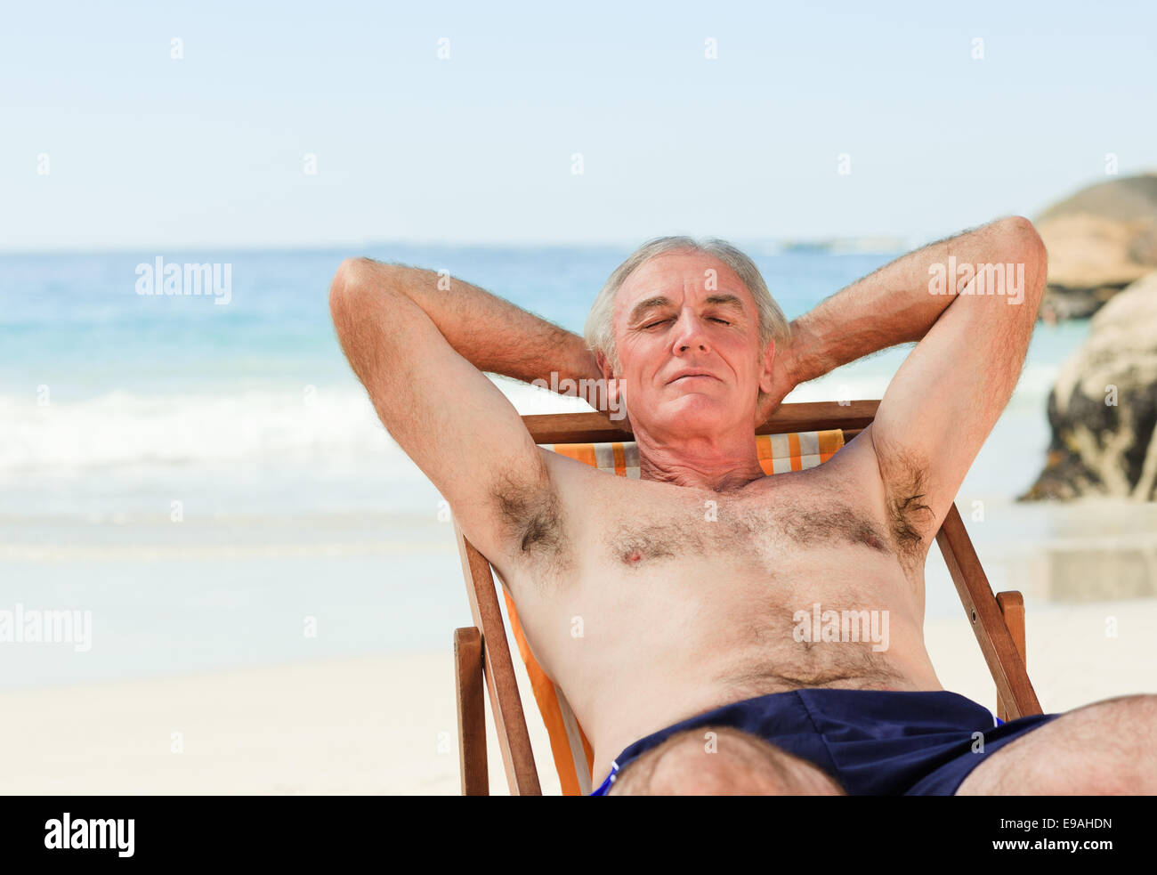 Lying down beach chair hi res stock photography and images Alamy