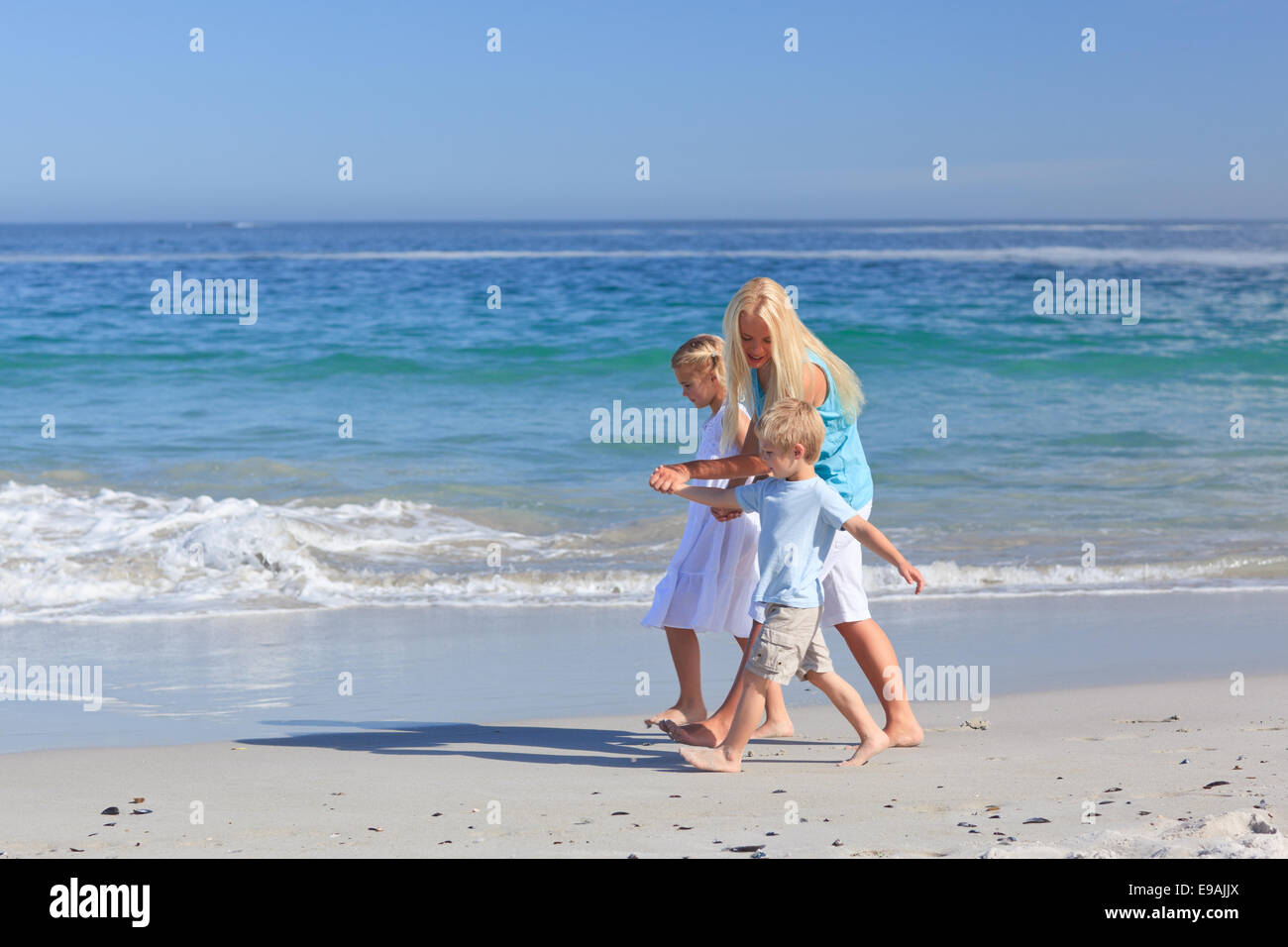 Brother and sister on the beach hi-res stock photography and images - Alamy