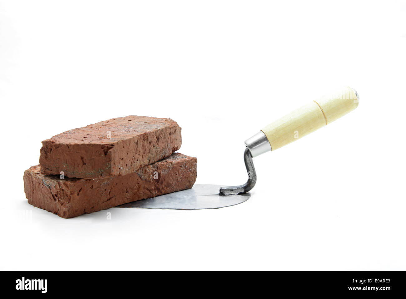 lute trowel with red brick Stock Photo Alamy