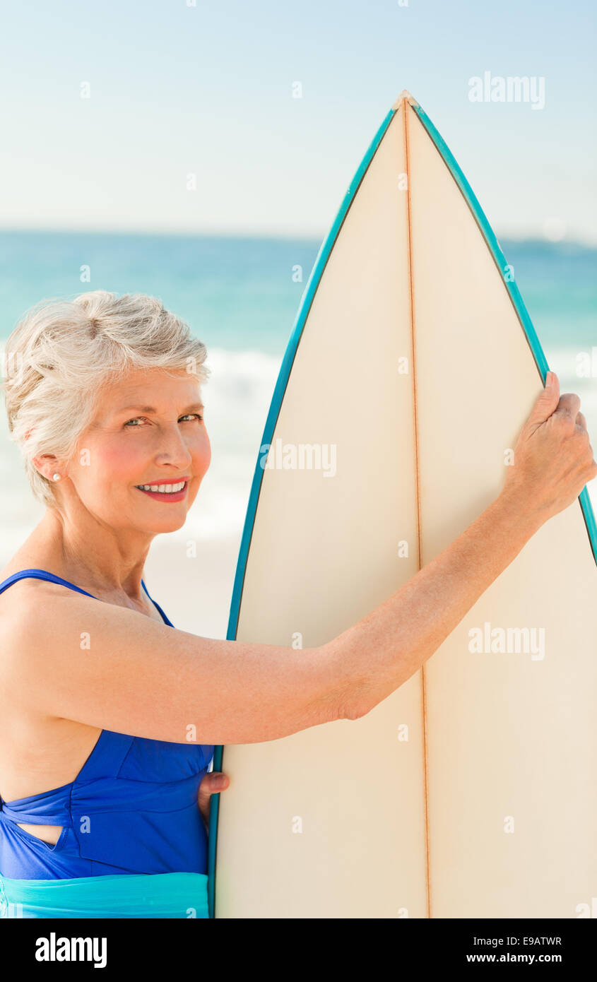 Mature woman surf board hi-res stock photography and images - Alamy