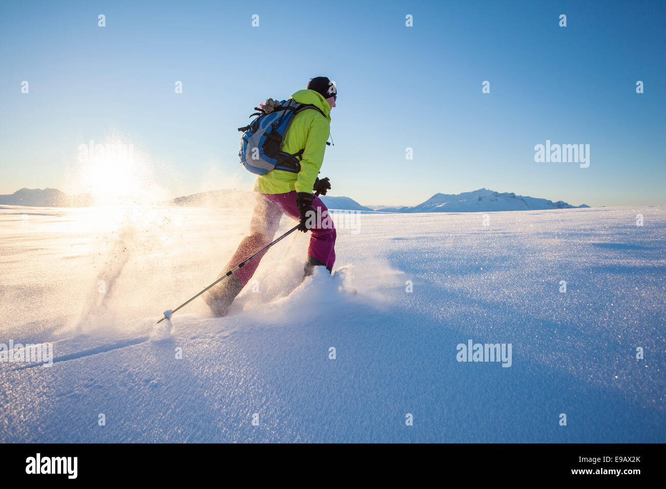 Snowshoe walker on Rodtinden, Kvaloya, Tromso, Troms, Norway Stock Photo