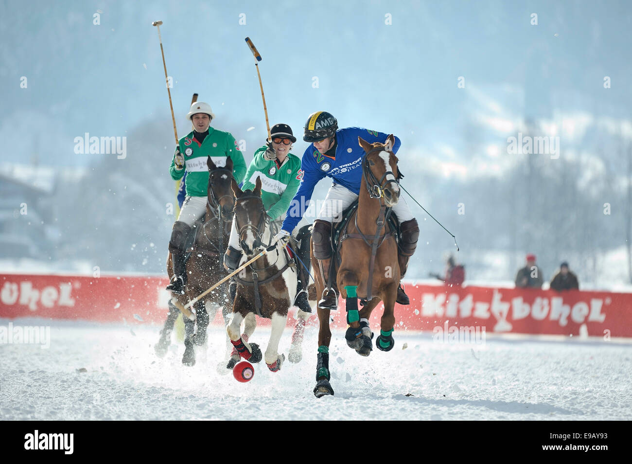Team Kitzbühel, green, versus Team Tom Tailor, blue, Polo on Snow, Polo tournament, 11th Valartis Bank Snow Polo World Cup 2013 Stock Photo