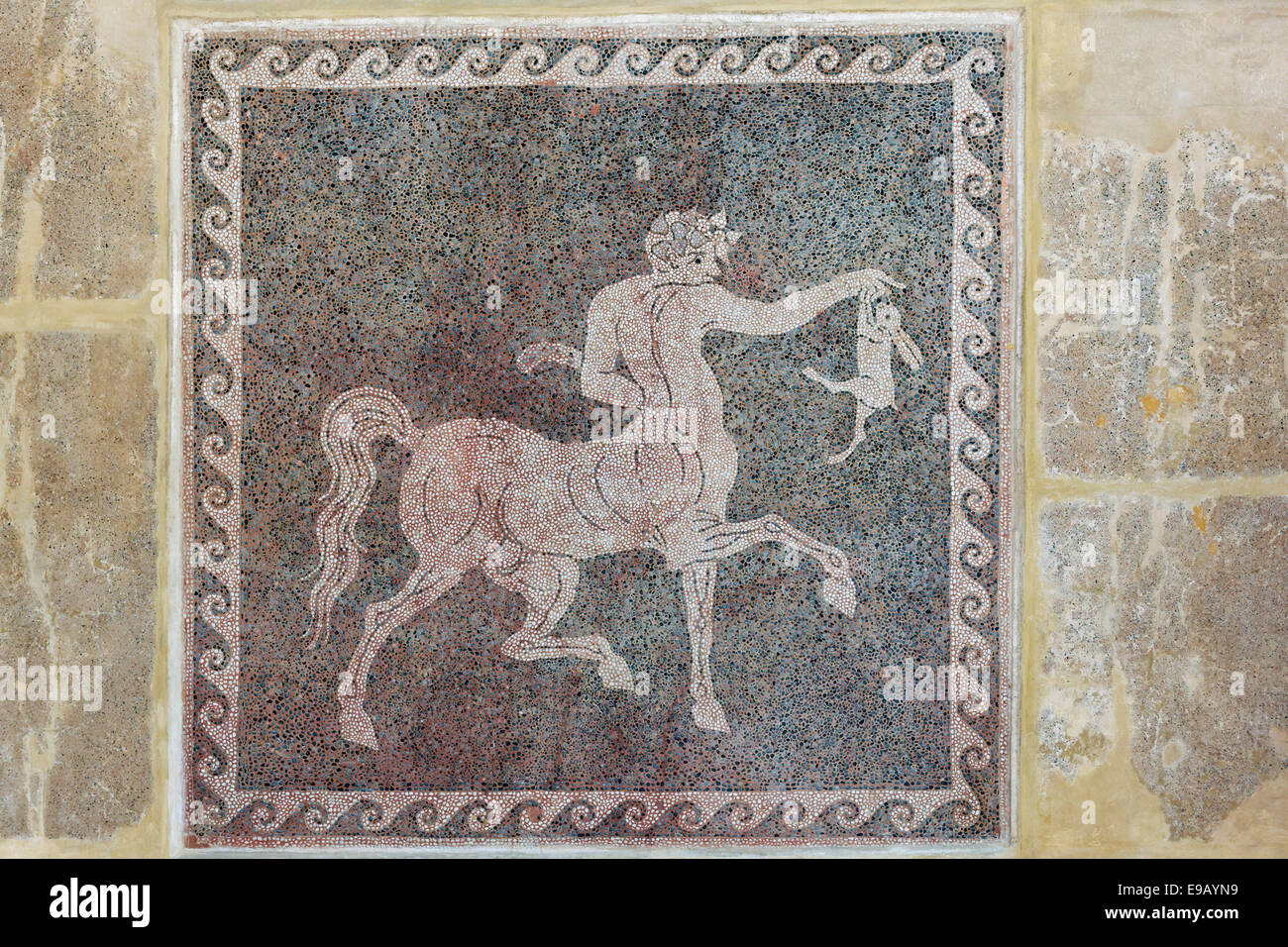 Centaur holding a slain rabbit, floor mosaic made of pebbles, Chochlaki, Archaeological Museum, historic town centre, Rhodes Stock Photo
