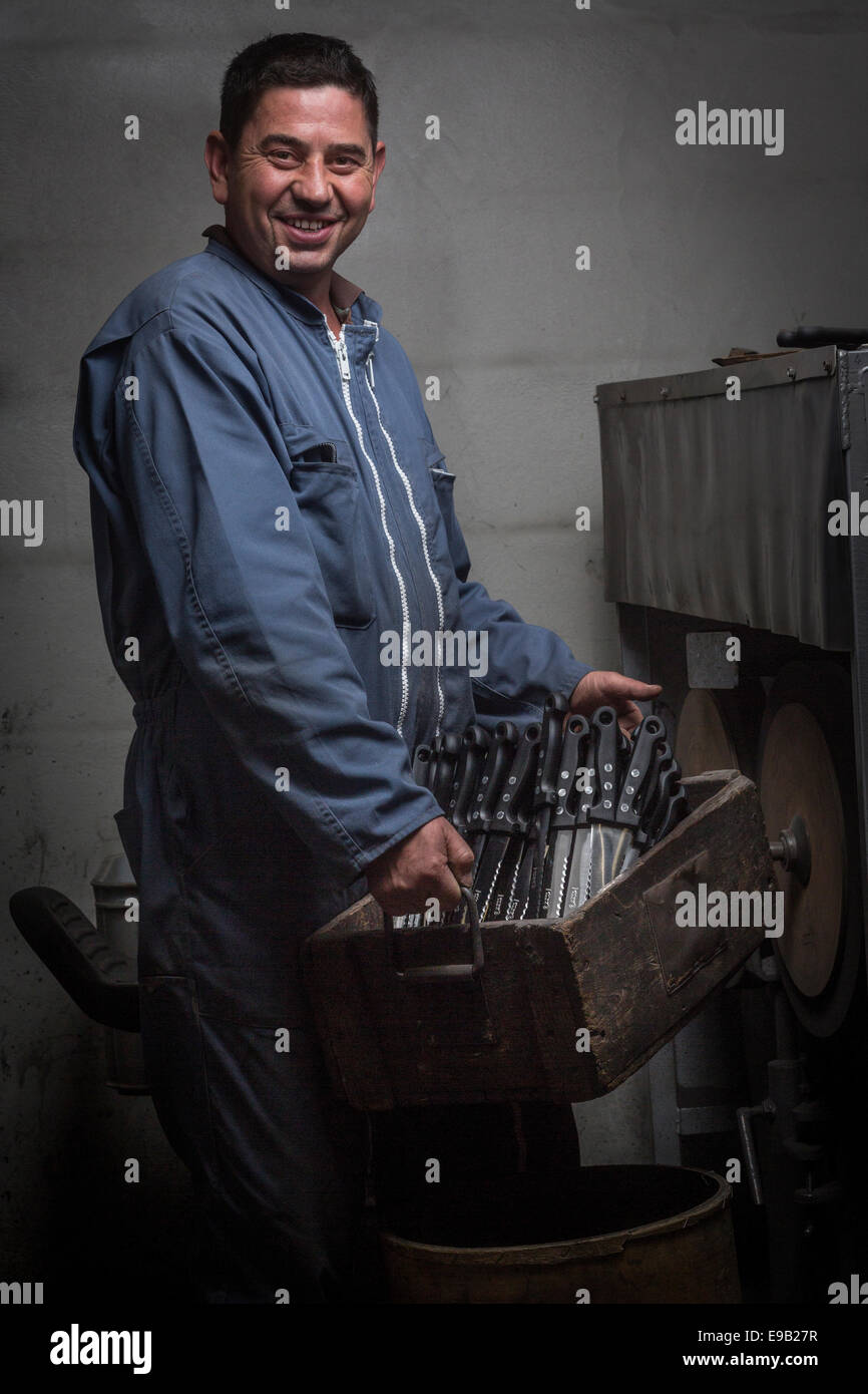A cutler worker portrait in a Thiers cutlery works (France). Ouvrier coutelier dans une coutellerie thiernoise (Thiers - France) Stock Photo