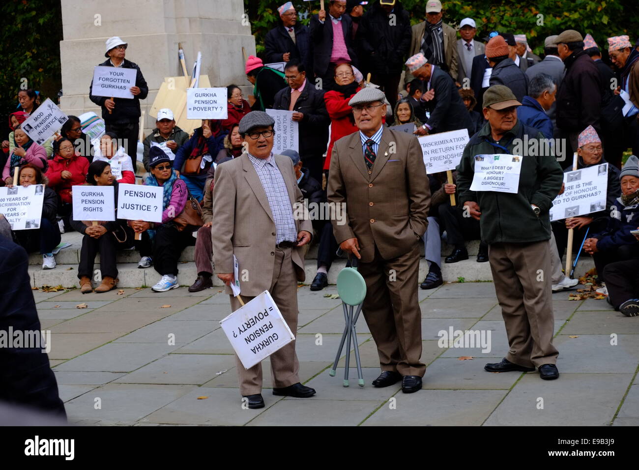 London, UK. 23rd Oct, 2014. Veteran Gurkhas gather outside parliament in protest against 'unfair' military pensions. Credit:  Rachel Megawhat/Alamy Live News Stock Photo