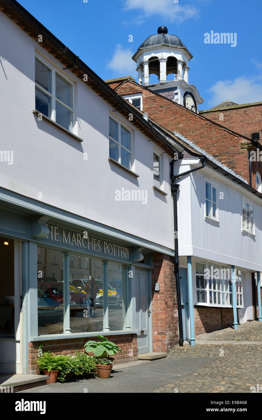 Shops and clock tower on Broad Street, Ludlow, Shropshire, England