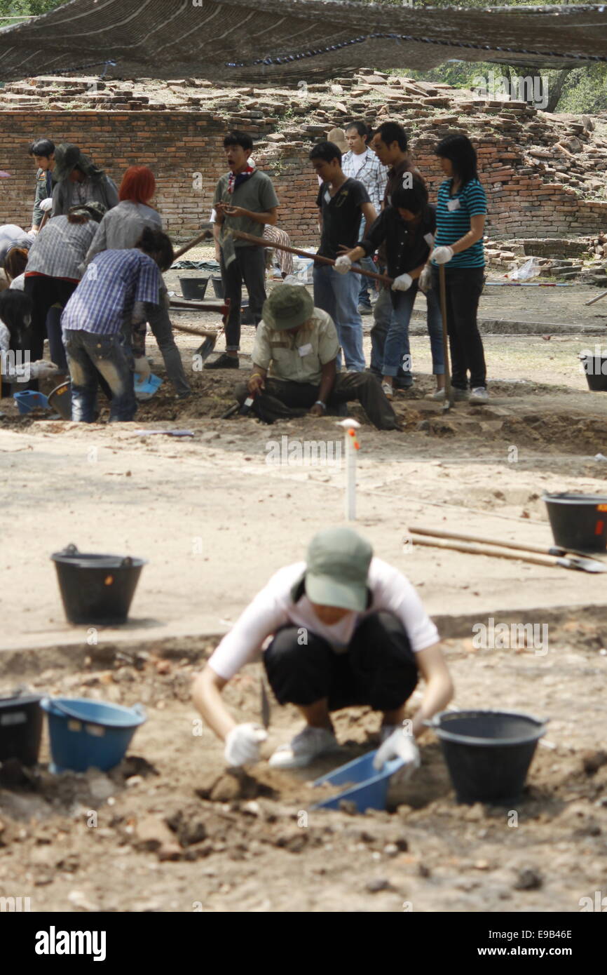 Archaeological dig conducted by young Thai on the site of Ayutthaya is a World Heritage Site by UNESCO. Stock Photo