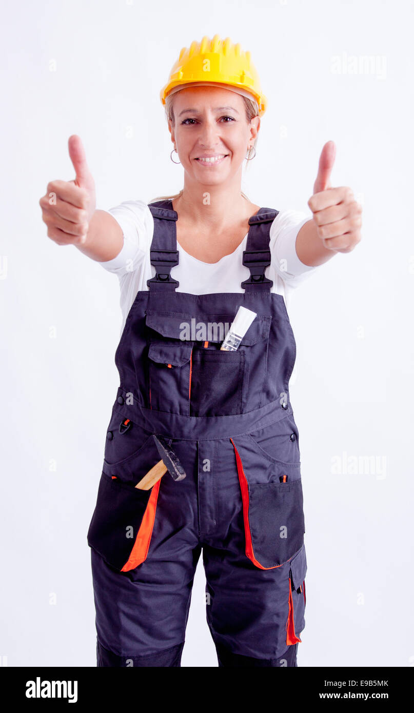 Female construction worker with tools on white background Stock Photo ...