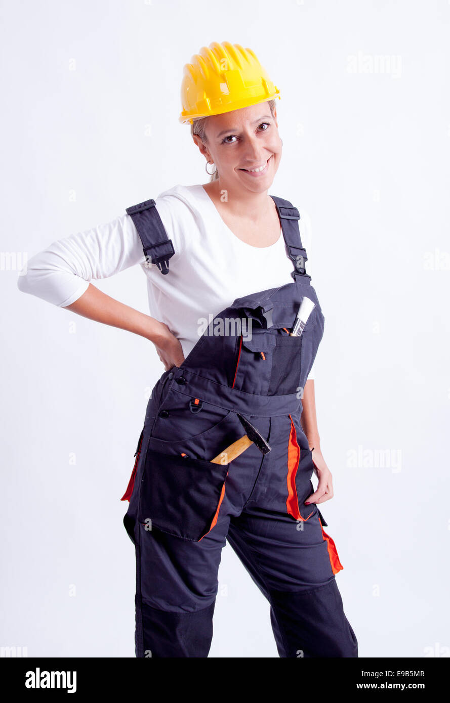 Female construction worker with tools on white background Stock Photo ...
