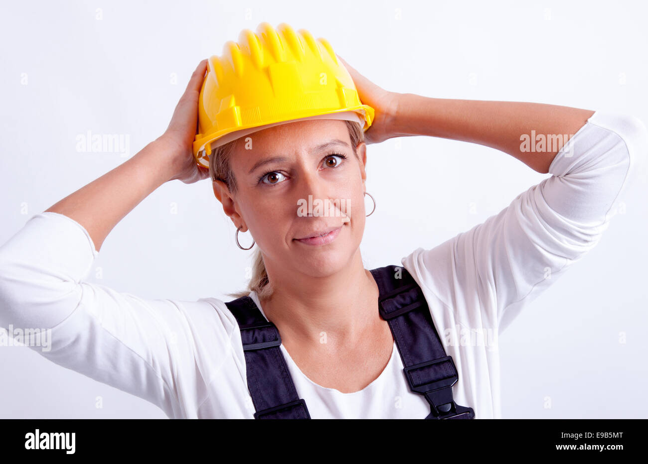 Female construction worker with tools on white background Stock Photo ...