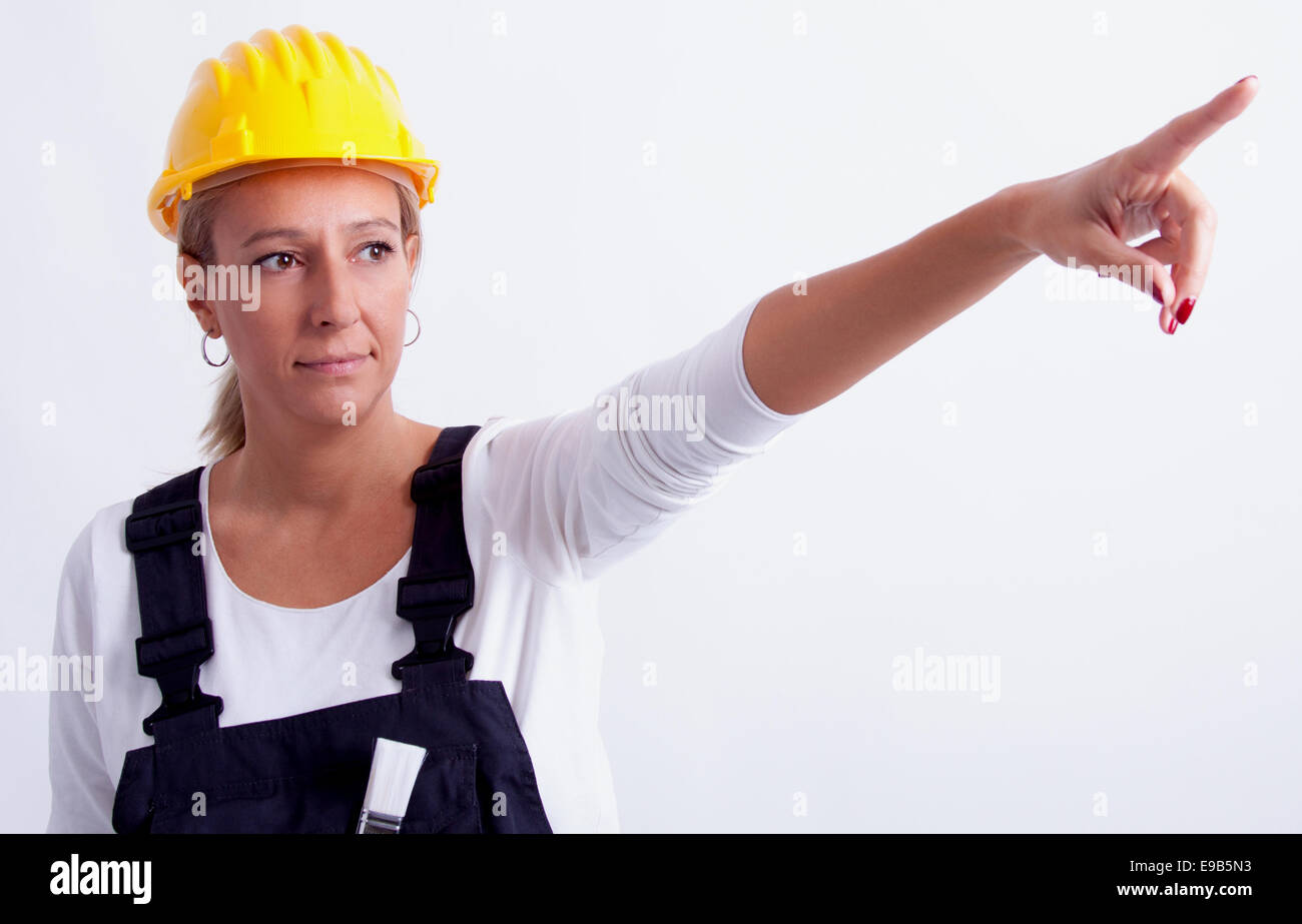 Female construction worker with tools on white background Stock Photo ...