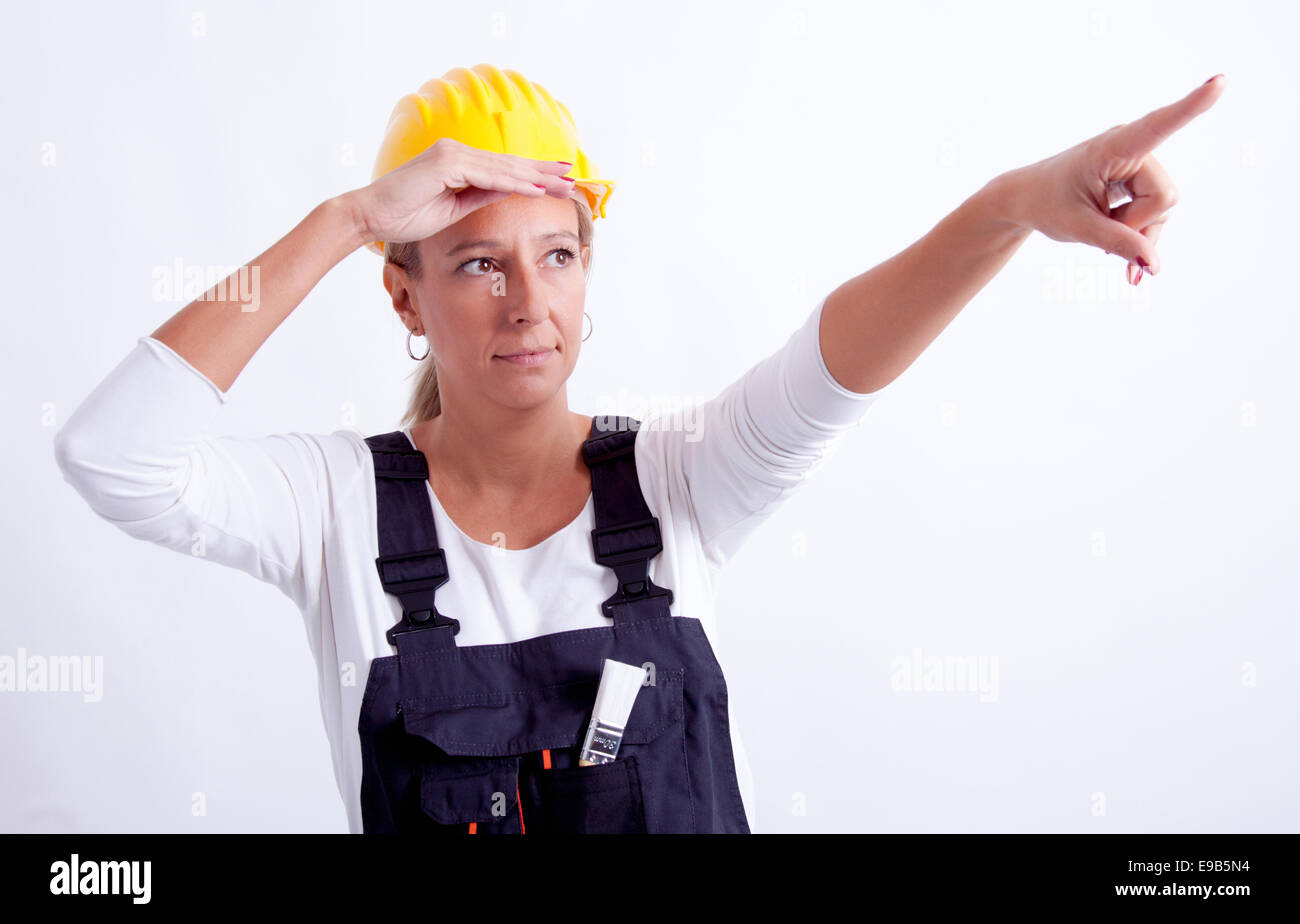 Female construction worker with tools on white background Stock Photo ...
