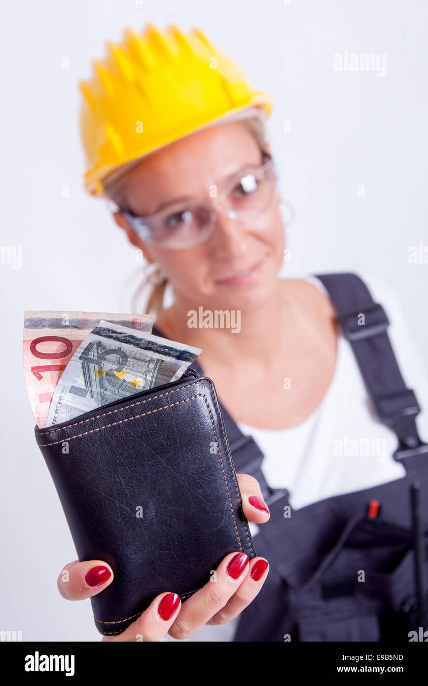 Female construction worker with tools on white background Stock Photo ...
