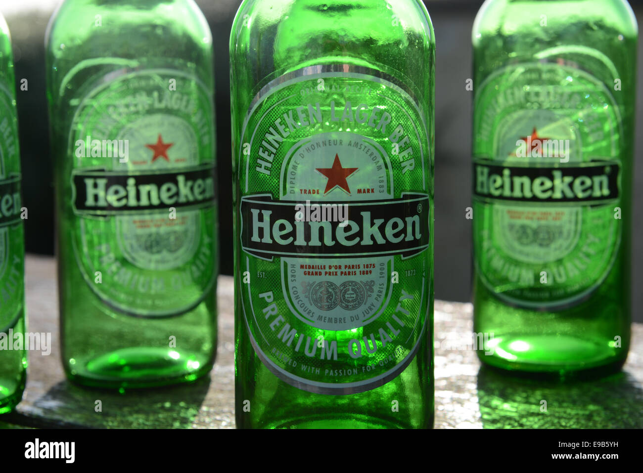 Heineken bottles on top of a picnic table Stock Photo Alamy
