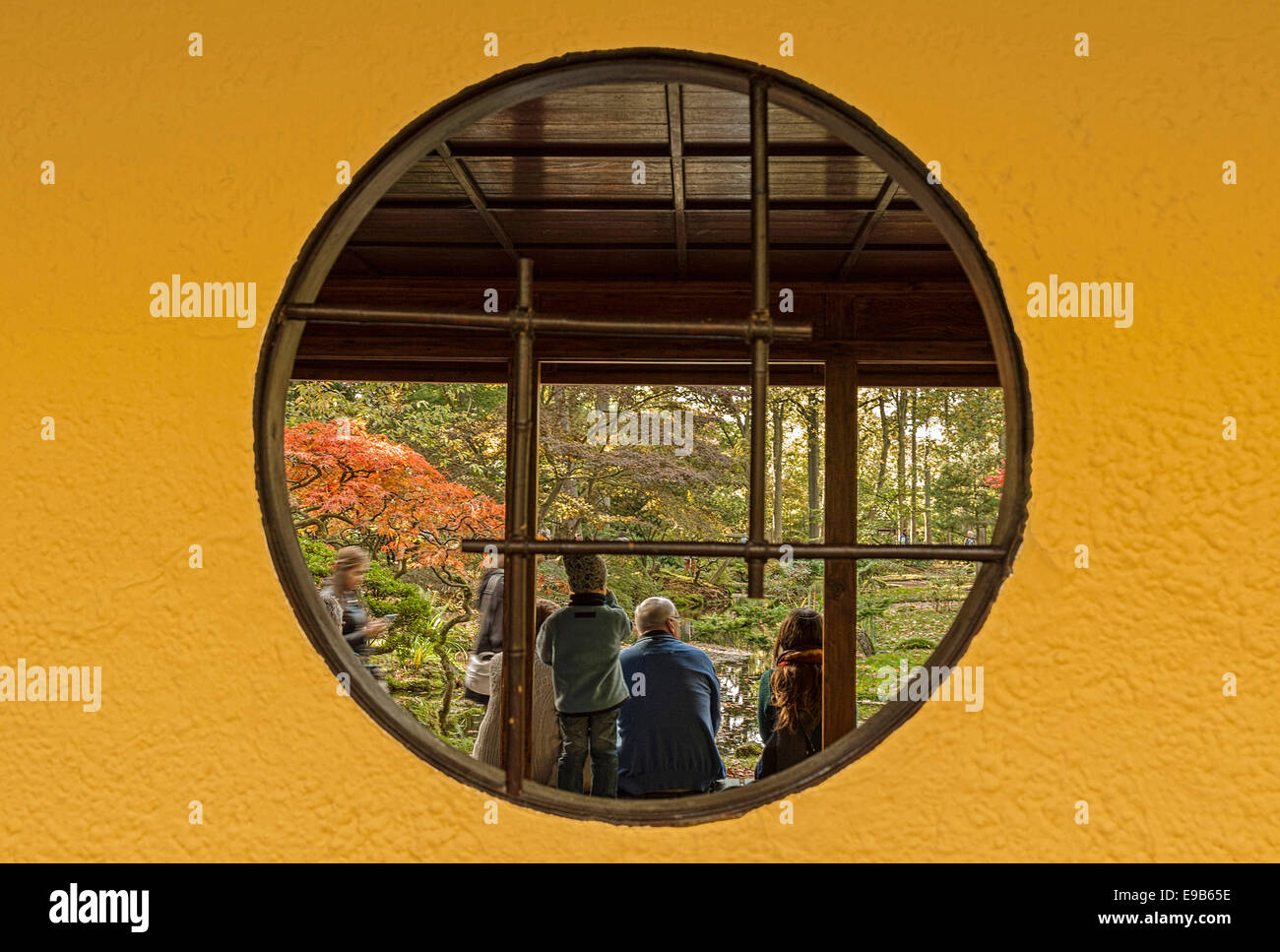 People enjoying the autumn mood in the Japanese Garden at Park Clingendael, The Hague, South Holland, The Netherlands. Stock Photo