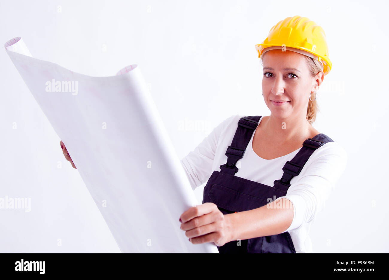 Female construction worker with tools on white background Stock Photo ...