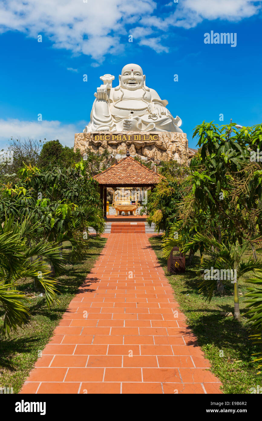 VUNG TAU, VIETNAM - JANUARY  2014: Buddha statue at top of a hill Stock Photo