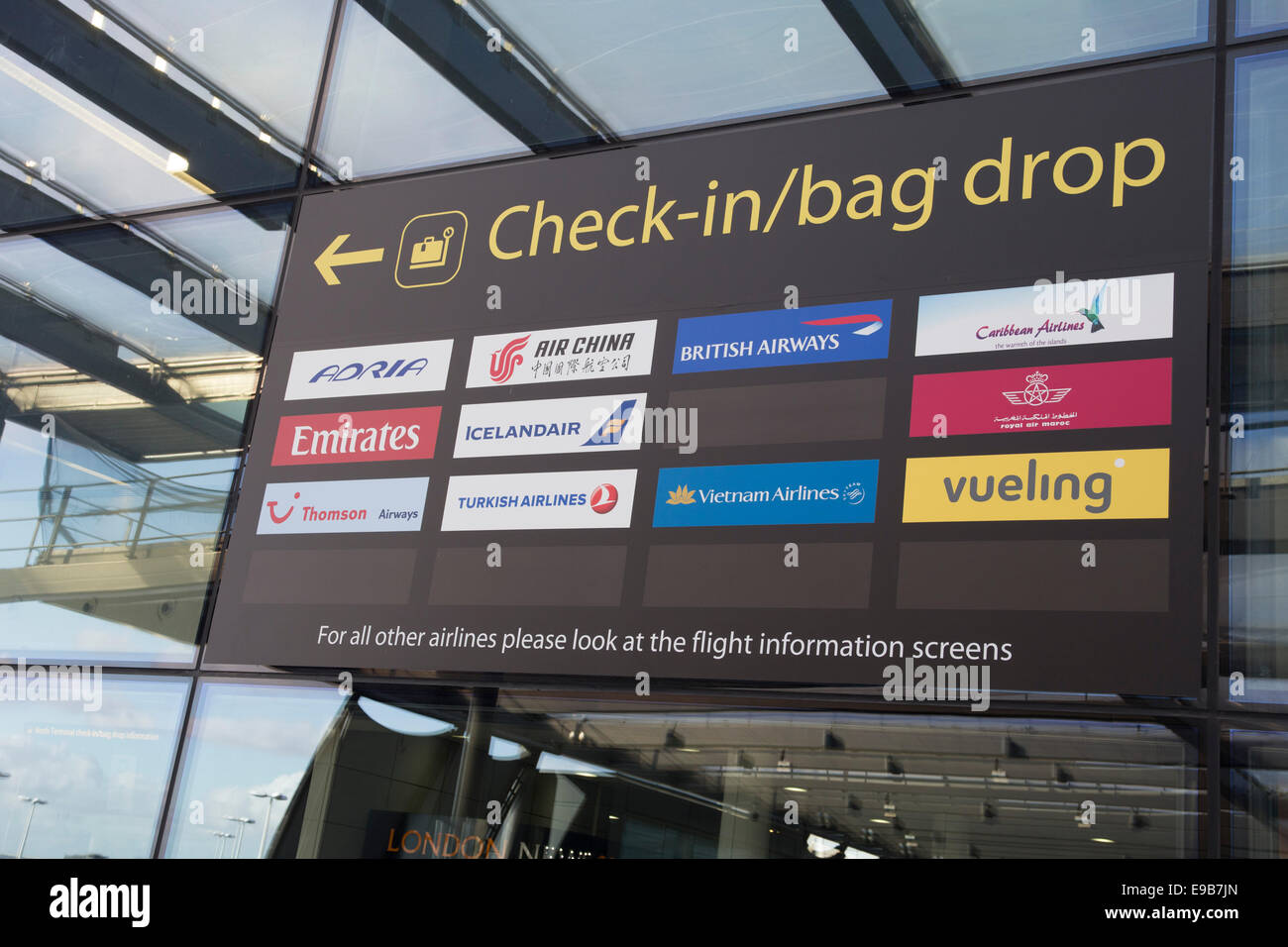 Sign at Gatwick Airport, London. Check-in/bag drop. Stock Photo