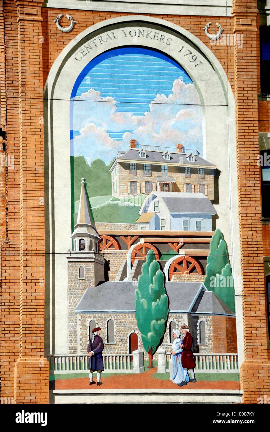 YONKERS, NY: Trompe l'oeil painting of Central Yonkers circa 1797 with Philipse Hall Manor at the top decorates a building wall Stock Photo
