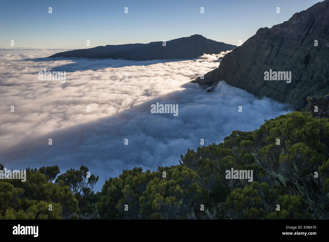 sea of clouds above Cilaos basin, Cirque de Cilaos, Reunion, Africa Stock Photo